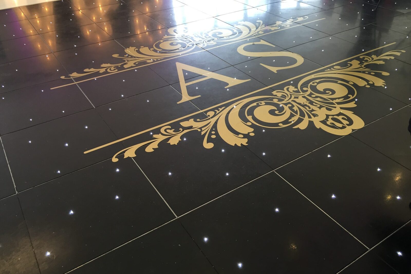 Gold monogram decal detail